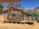 Arriendo parcela agrado con cabaña de troncos en bosque nativo